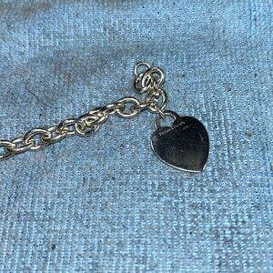 Tiffany & Co 3 Charms Snoopy & Woodstock giving Snoopy aBLUE DIAMOND FLOWER. Hel